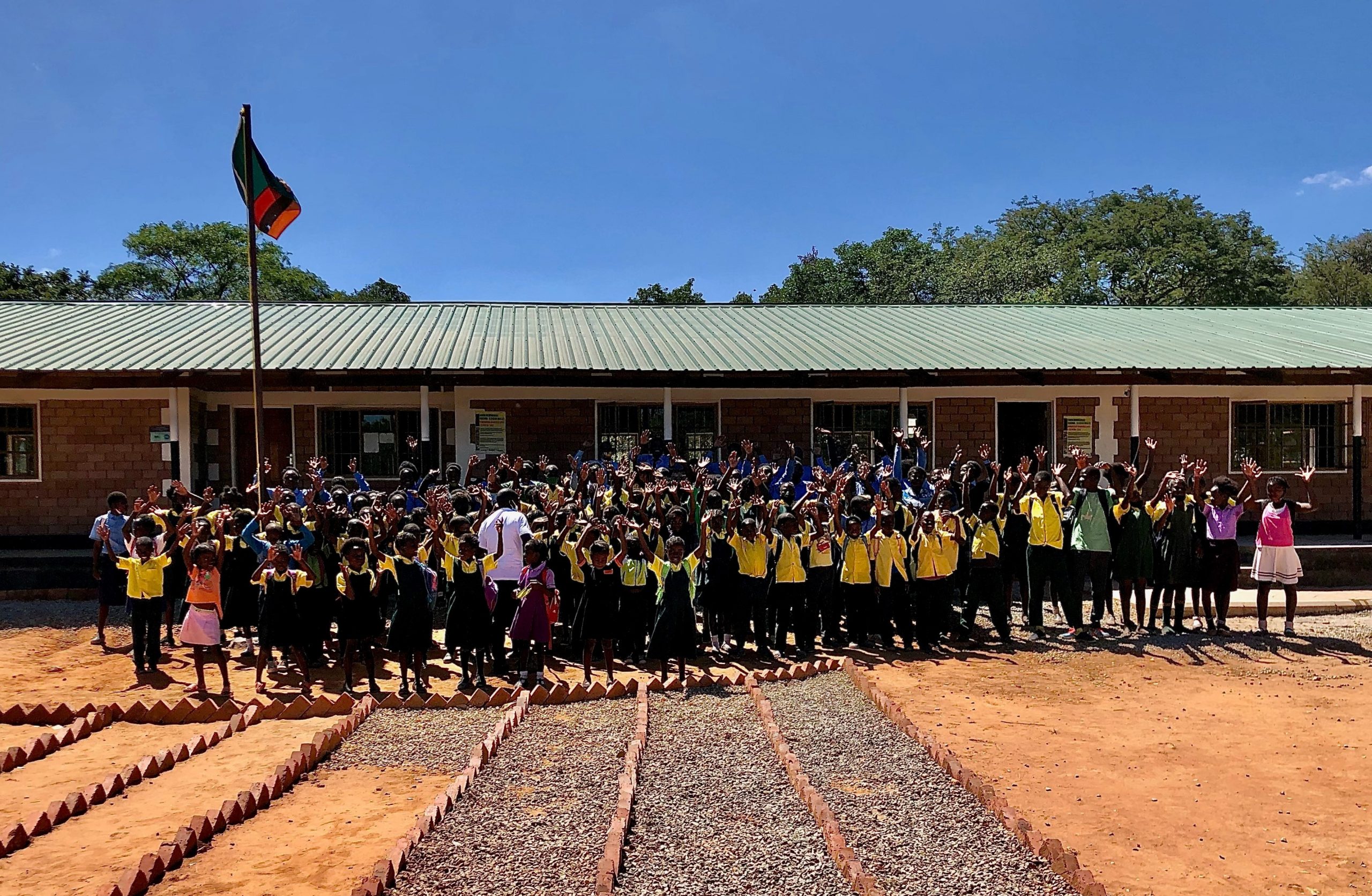 Group photo of children outside Naluyanda Community School