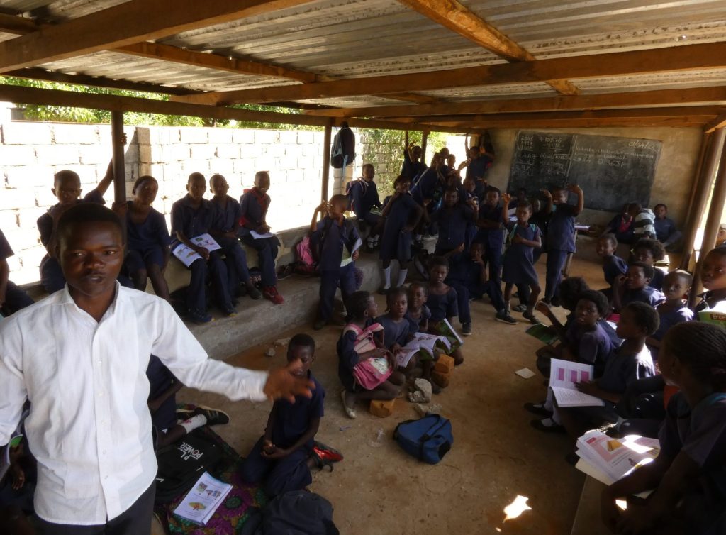 Teacher Nelson and Grade 3 at Zambezi Sawmills Community School