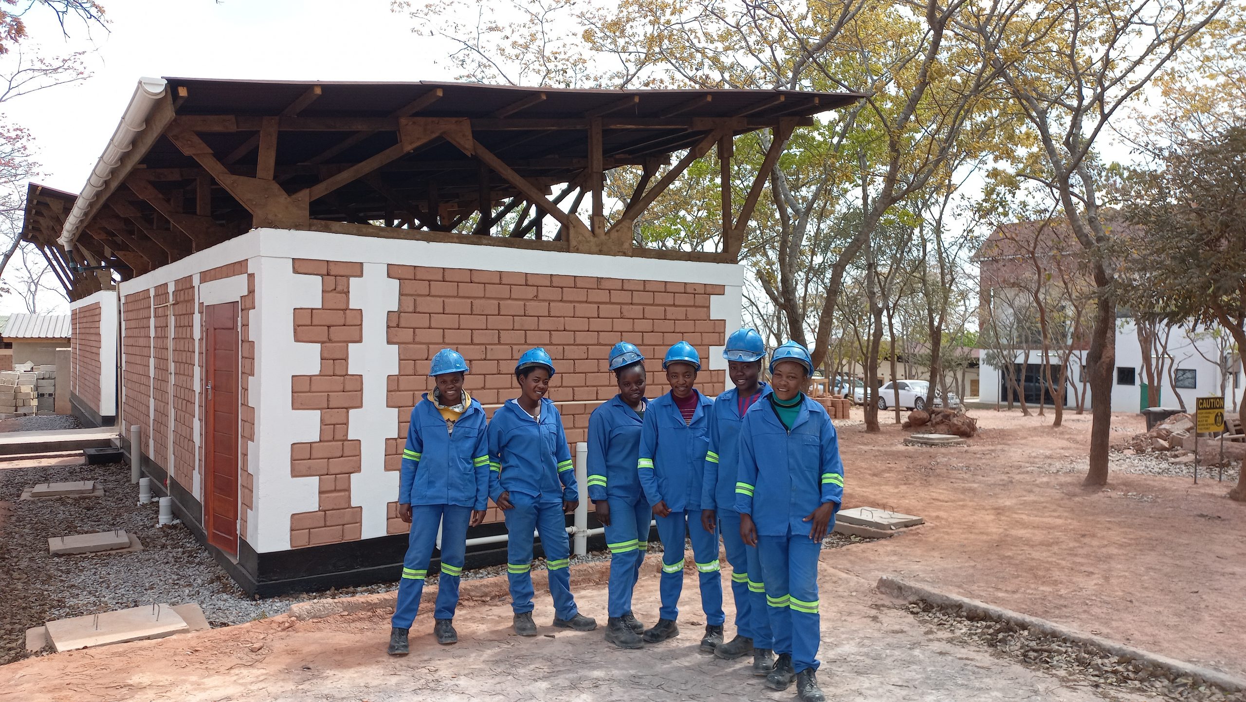 Trainees outside the student toilet block at the Centre for Excellence