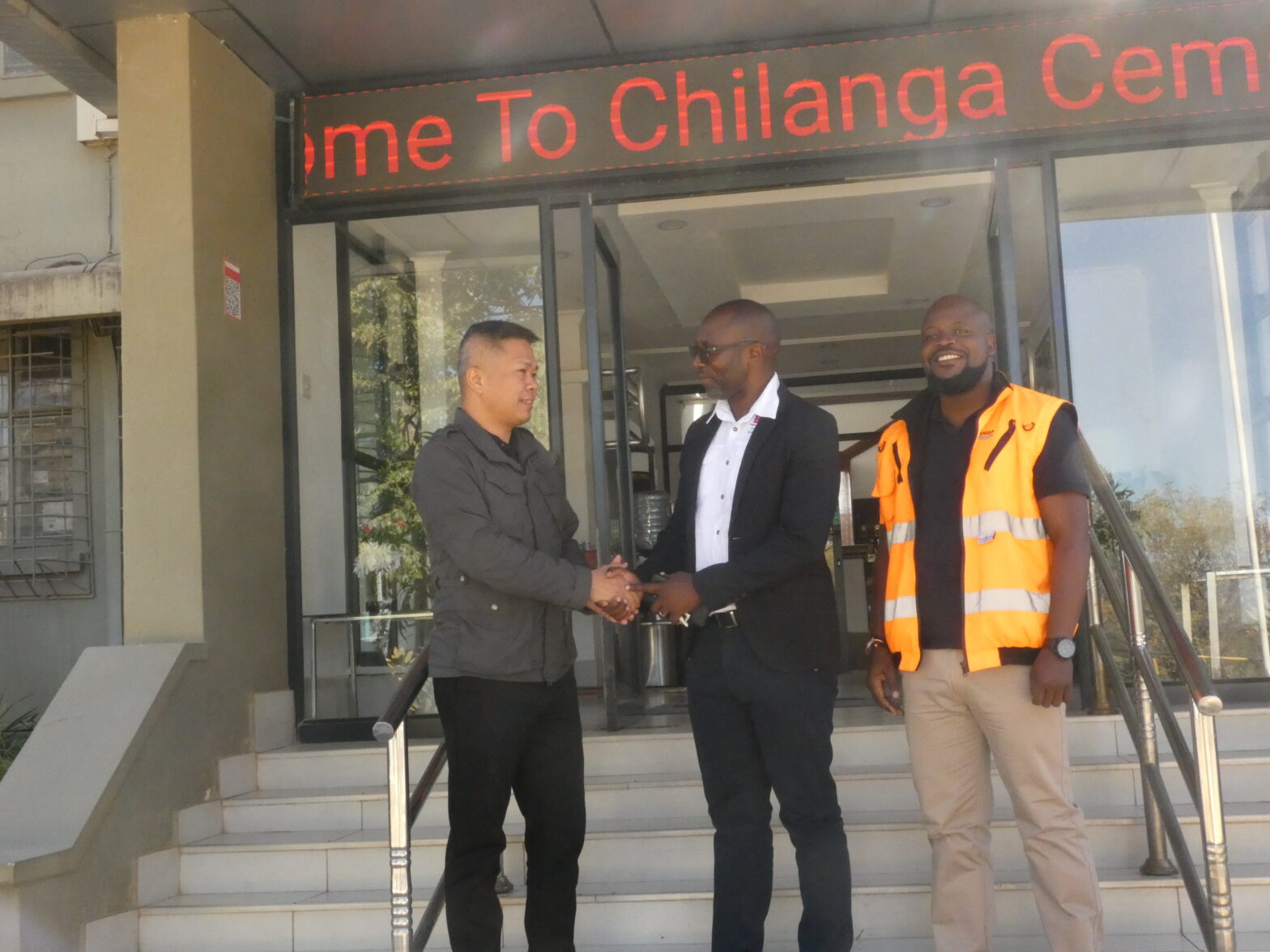 Huang Furu (Head of Procurement, Chilanga Cement Plc), Clayton Kachamba (Build It, Business Development Manager) and Gift Danga (Cooperate Affairs & Communications Manager, Chilanga Cement Plc)